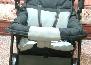 عربة أطفال توأم