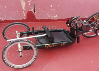 Chaise roulante vélo à main