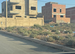 Terrain avec deux façades