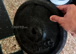 Poids de course, barre et disques pour soulever des poids