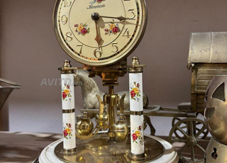 Horloge Symphonia en laiton décoré