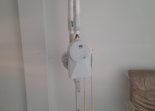 Appareil de radiographie dentaire mobile en bon état