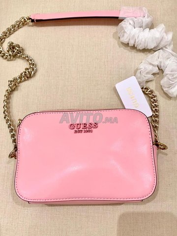 حقيبة غيس الوردية للنساء أصلية