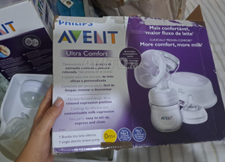 TIRE LAIT presque neuf