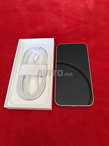 آيفون 16E أبيض 128 جيجابايت - جديد بضمان سنتين