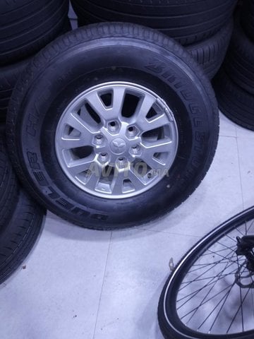 4 pneu et jantes Mitsubishi original bredgistone 