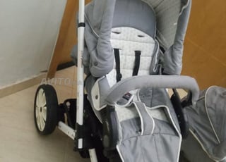 عربة أطفال مستعملة قطعتين