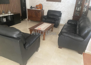 Fauteuil de salon en cuir en très bon état