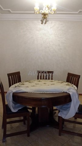 Table à manger de luxe en bois massif avec 8 chaises
