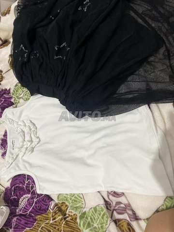 طقم تنورة وقميص للأطفال