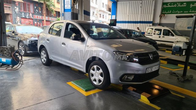 logan gris bonne état