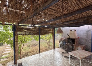 Ferme à vendre avec maison, puits, château d’eau.