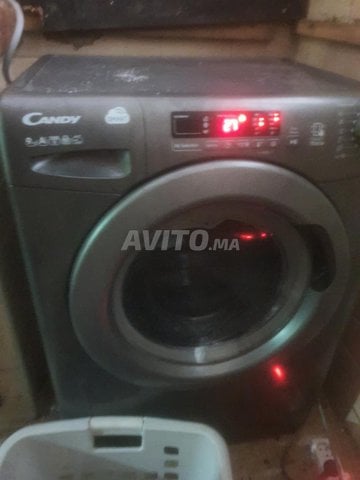غسالة كاندي 9 كغ رمادية بحالة جيدة