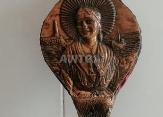 Rabose sculpté en cuivre rouge