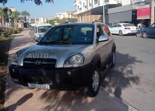 Tucson en bon état diesel boite auto, avec clim