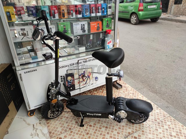 سكوتر كهربائي صغير كالجديد