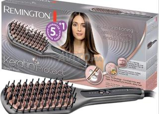 فرشاة تمليس الشعر الأيونية Remington 2 في 1 ريف CB7480