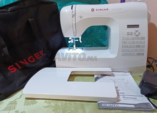 ماكينة خياطة سنجر آلة الخياطة