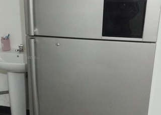 Grand réfrigérateur en bon état à vendre