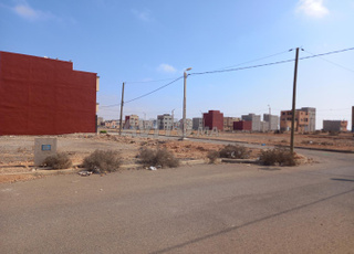 Terrain commercial avec deux façades à vendre