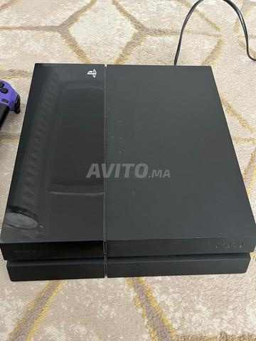 PlayStation 4 avec deux manettes, GTA5 et NBA 2K21 - 2