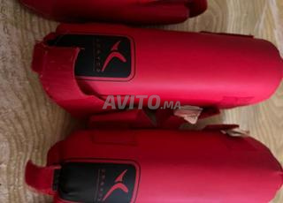 Protège-tibias et pieds DOMYOS rouges