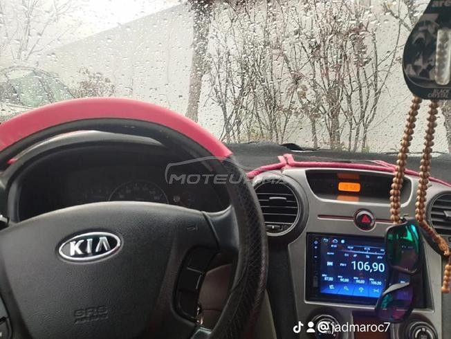 kia carens 2009 7 places