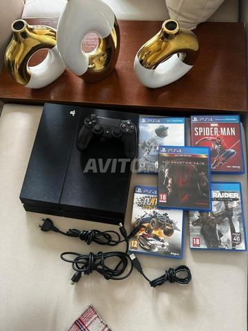 ps4 500go avec une manette et 5 jeux