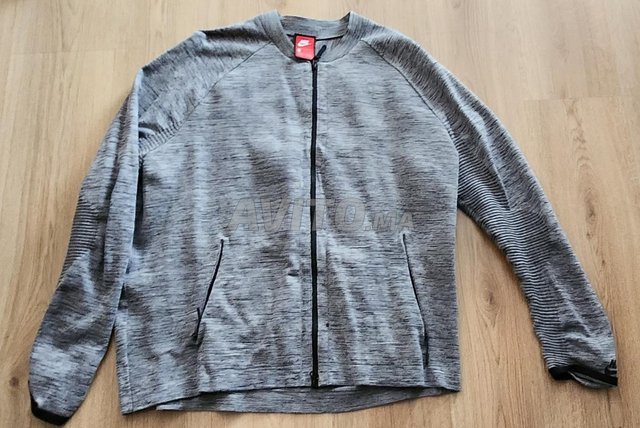 سترة نايك تك