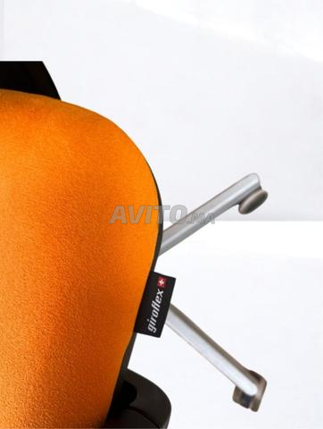 كرسي مريح Giroflex 434 برتقالي أسود شبكي
