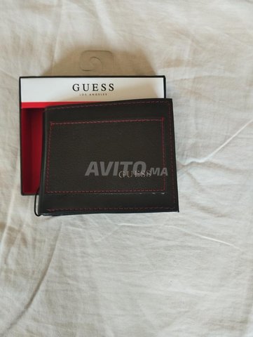 Portefeuille Guess and Columbia