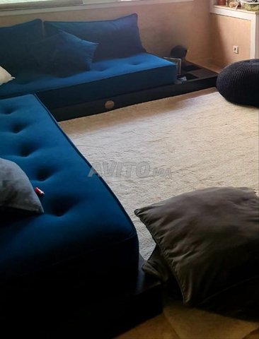 Salon en bois et matelas