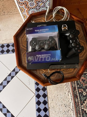 PS3 2 manettes 21 jeux