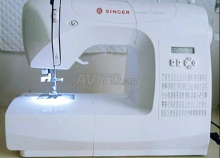 Machine à coudre Singer آلة الخياطة