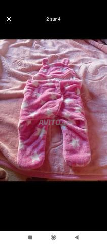 ملابس أطفال الرضع من 3 شهور إلى سنة