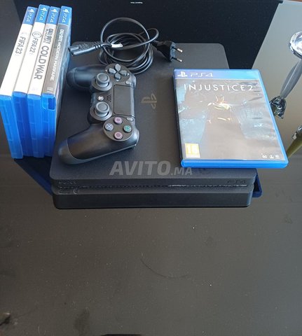 Playstation 4 slim 1To et 5 jeux gratuits