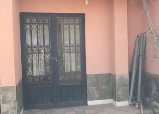 Un hectare avec maison à vendre