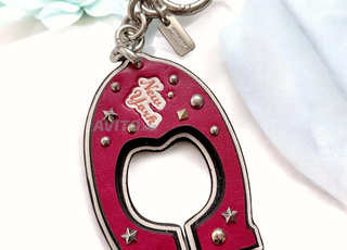 Porte-clés sac COACH New York Big C Varsity