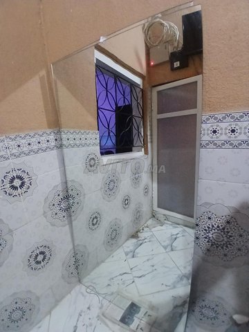 Grand miroir mural en bon état - 150×80 cm