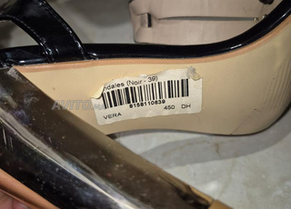 Elite - Talons réfléchissants taille 39 - Utilisé une seule fois