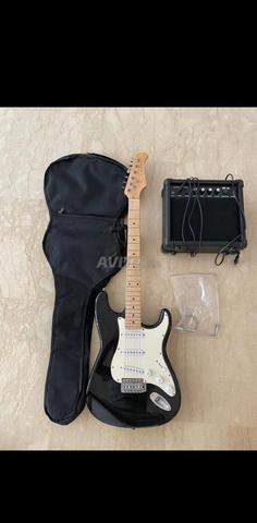 Guitare avec amplificateur en très bon état