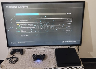 PS4 Slim 1TO avec 5 CD et 2 manettes originales