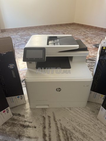طابعة HP color Laser Pro MFP M477fnw مع 4 خراطيش hp