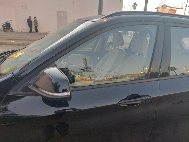 bmw x1 à ventre 