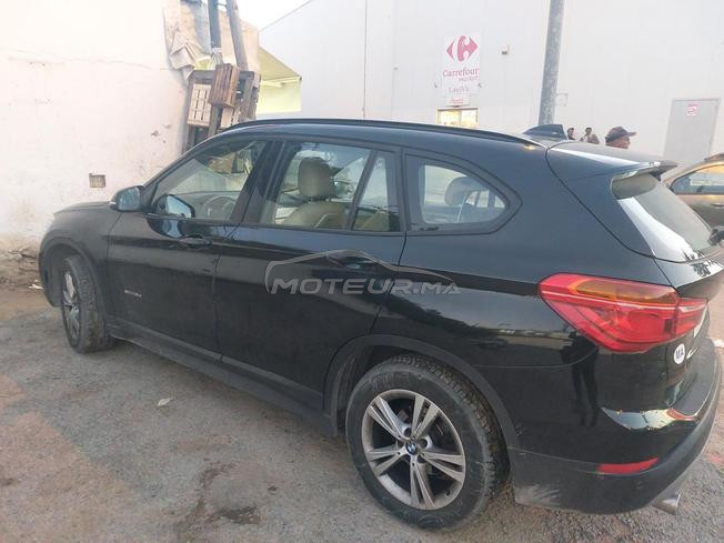 bmw x1 à ventre 