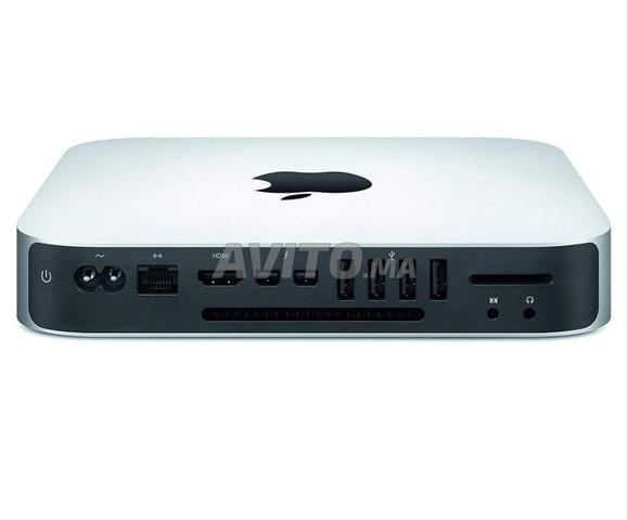 Mac Mini مع شاشة Pro