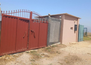 Terrain agricole avec maison