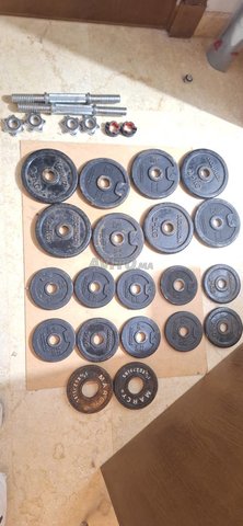 أقراص أوزان للكمال الأجسام مع بار