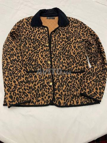 سترة جلد النمر مقاس M