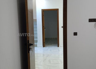 Appartement 64 m² et garage commercial 19 m²